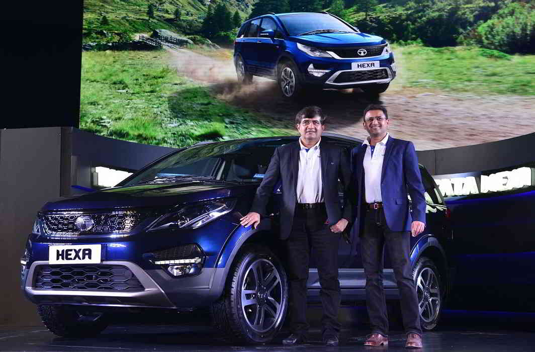 The new machine on the block- Mayank Pareek, President - Passenger Vehicles Business Unit, Tata Motors and Vivek Srivatsa, Head - Passenger Vehicles Business Unit, Tata Motors, launching 'Tata Hexa' car in New Delhi on Wednesday night. UNI PHOTO