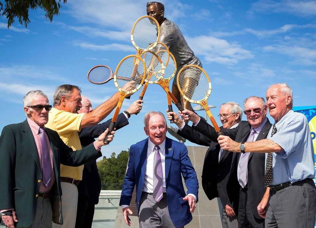LIVING LEGENDS: Former Australian tennis player Rod Laver (C) celebrates with fellow former Australian players (L-R) Ken Rosewall, John Newcombe, Fred Stolle, Roy Emerson, Frank Sedgman and Neale Fraser the installation of a bronze statue of himself outside Rod Laver Arena at Melbourne Park during a promotional event for the ongoing Australian Open tennis tournament, Reuters/UNI