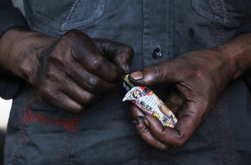 Ashen hands tell tales of overworked , underpaid, unaware workers.