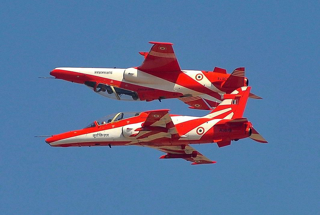 FLYING TWINS: The Indian Air Force's aerobatic display team 'Surya Kiran' performs during Aero India show at the Yelahanka Air Force Station in Bengaluru, Reuters/UNI