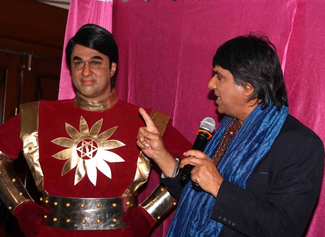 FEEL THE FORCE: Television actor Mukesh Khanna unveils a wax statue of Shaktiman in Mumbai, UNI