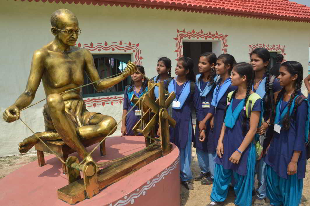 BREAK FROM LESSONS: School students at the 100 years celebration of Mahatma Gandhi's Champaran Yatra to mark the Bihar Diwas in Patna, UNI