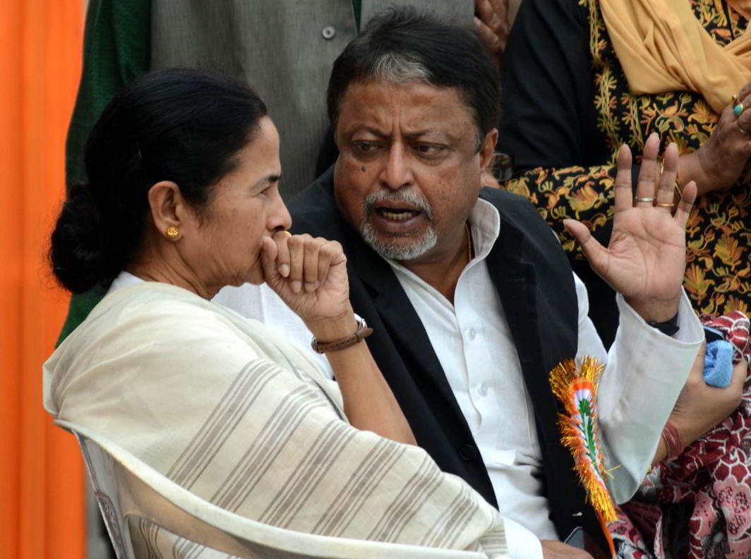 West Bengal CM Mamata Banerjee and TMC leader Mukul Roy, UNI