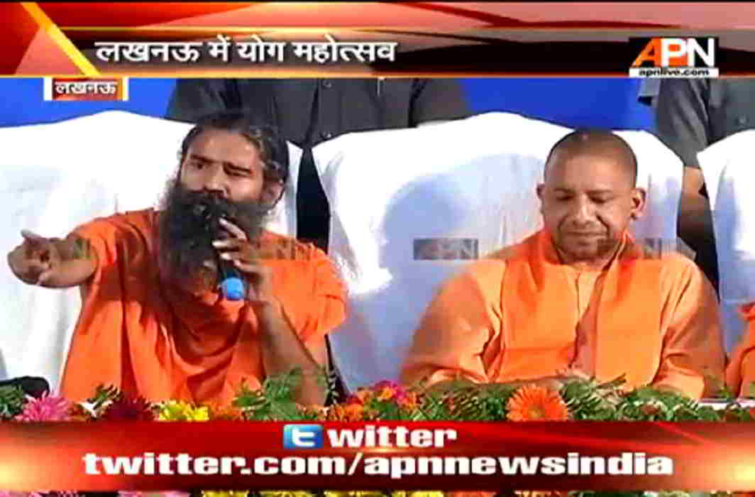 Baba Ramdev addressing press along UP CM Yogi Adityanath