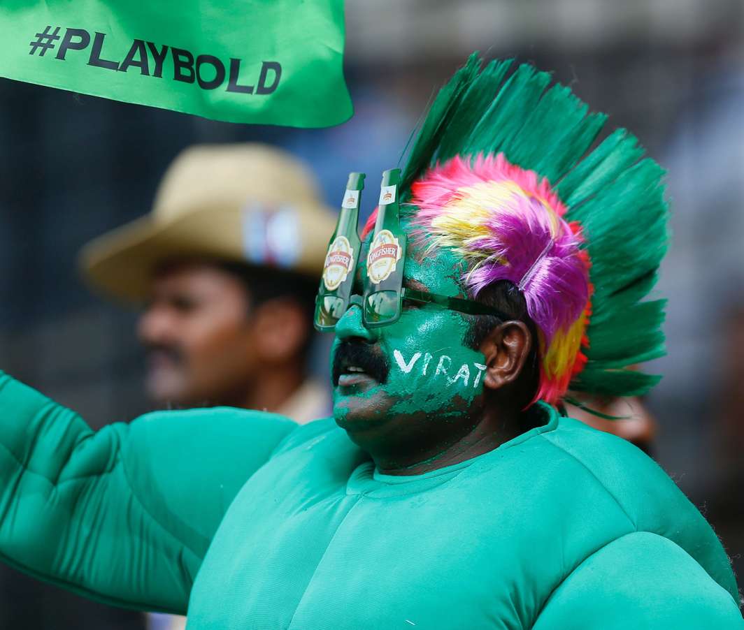 UNSTINTED LOVE: A fan of RCB and the team skipper Virat Kohli during the IPL-10 match between RCB and KKR, at Chinnaswamy Stadium in Bengaluru, UNI