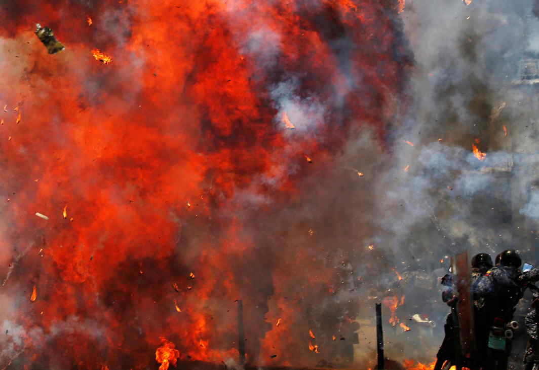 ANARCHY: Flames erupt as clashes break out while the Constituent Assembly election is being carried out in Caracas, Venezuela, Reuters/UNI