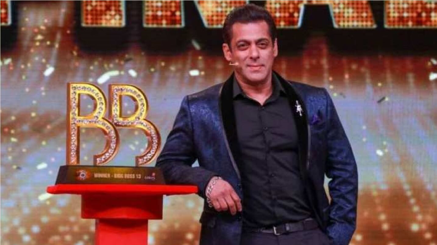 Salman Khan hosting the Bigg Boss 18 finale with contestants in the background