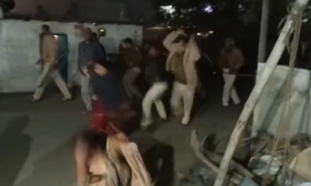 police beating up women with sticks in Bihar