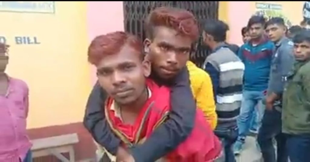 Viral: Man gives piggyback ride to his specially-abled friend from Bihar to West Bengal to watch Pathaan | WATCH