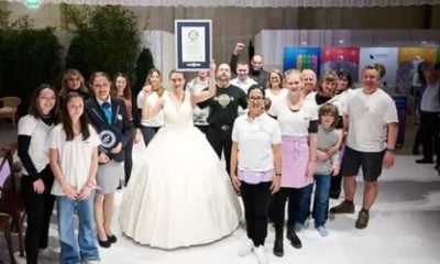 Switzerland Woman wearing largest wearable cake dress