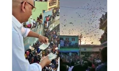 Former Gujarat sarpanch showers bundles of Rs 500 notes from his house at nephew's wedding, video viral | WATCH