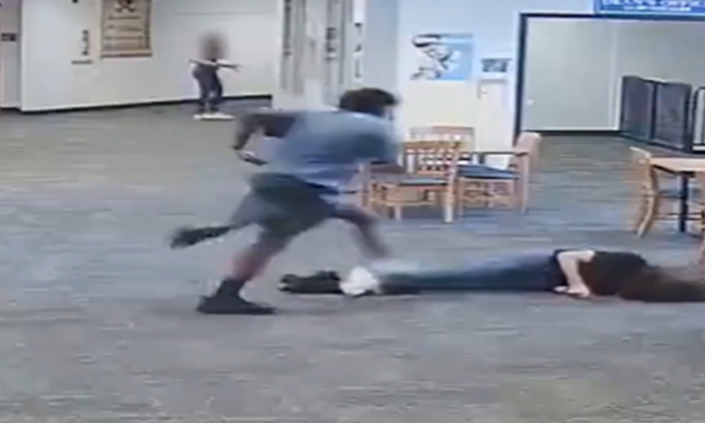 US student beats up teacher