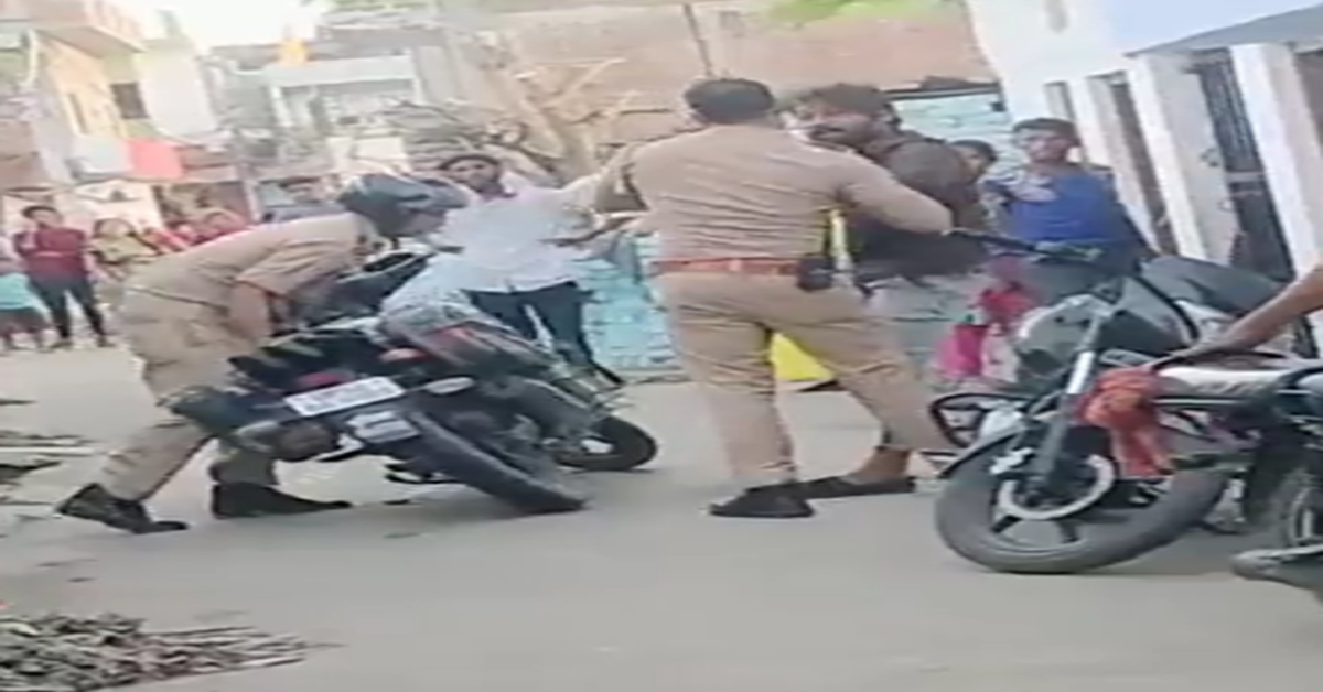 policemen beating up man in Uttar Pradesh