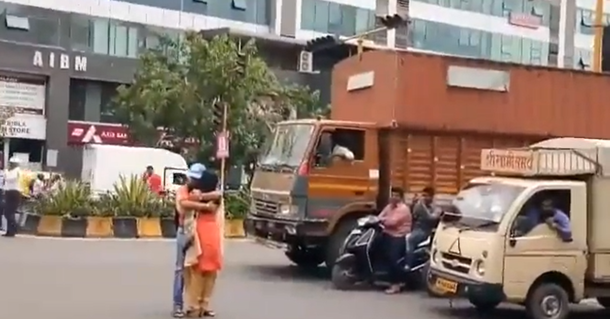 couple hugging in the middle of Pune road