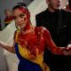 Woman in Ukrainian flag coloured gown spills fake blood on herself at Cannes red carpet; Watch video