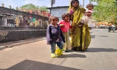 MP woman uses plastic bags as footwear to save her kids feet burning on the blistering roads