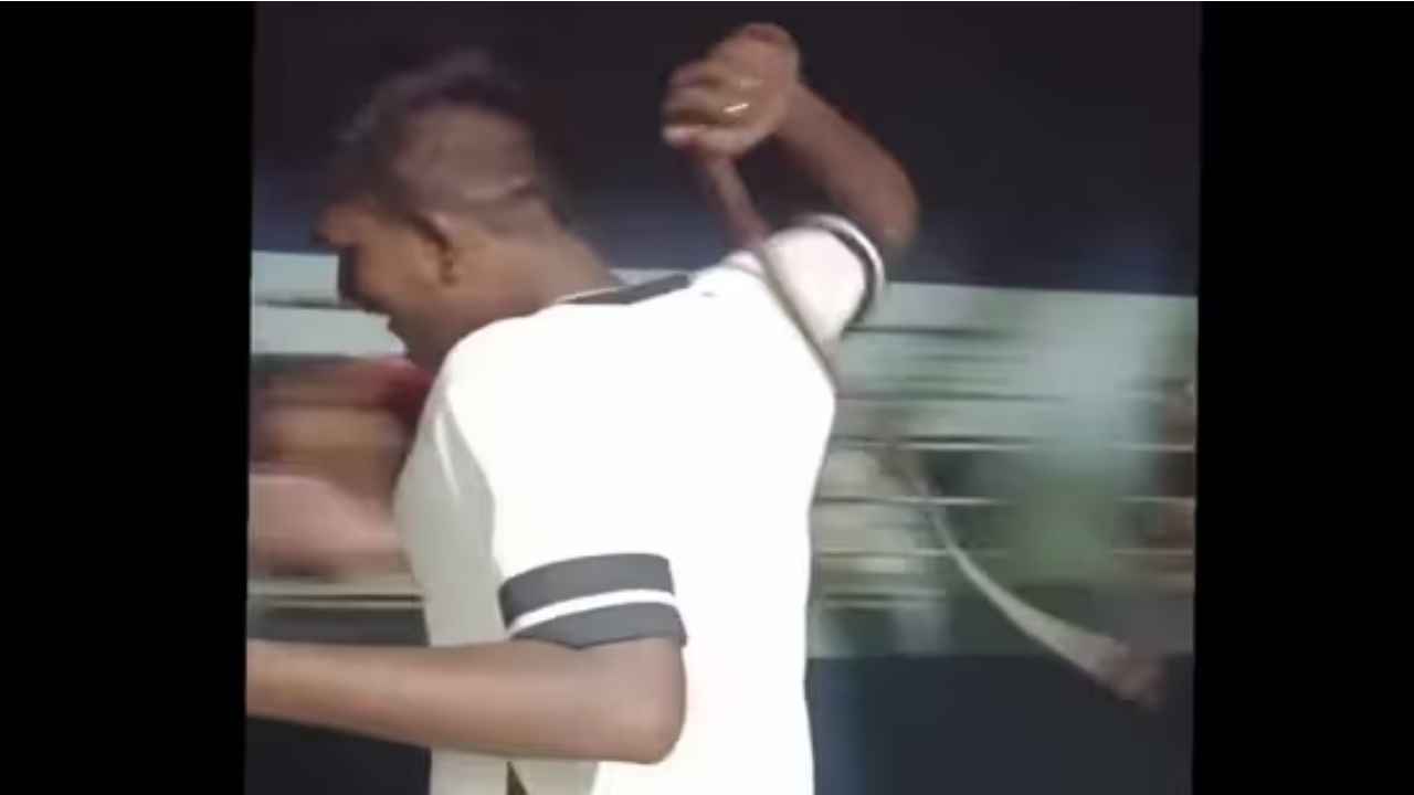 Watch: Man in a train hits passengers on another moving train with belt in Bihar