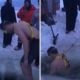 Watch: Man jumps into a frozen lake to retrieve friend’s lost phone