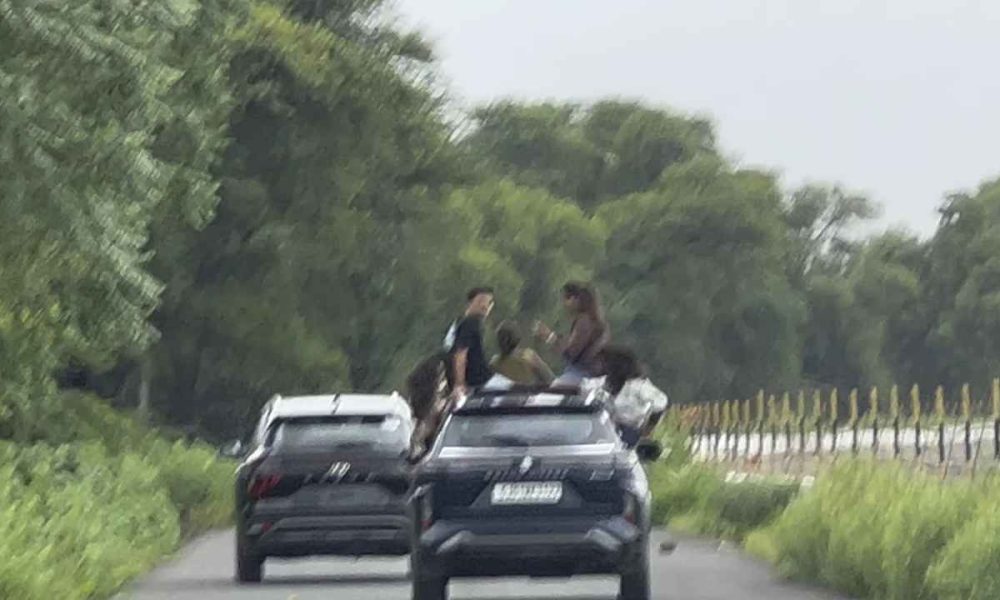 Watch: Six youth climb atop moving Maruti SUV near Narmada dam putting themselves in danger