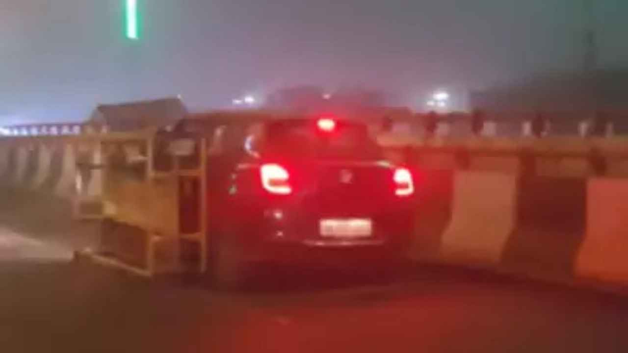 Watch: Swift drags Delhi police barricade on fly over, video goes viral