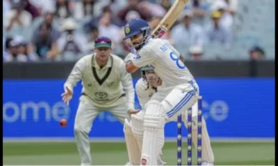 Nitish Reddy celebrates after scoring his first Test century during the fourth Test against Australia in Melbourne.