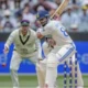 Nitish Reddy celebrates after scoring his first Test century during the fourth Test against Australia in Melbourne.