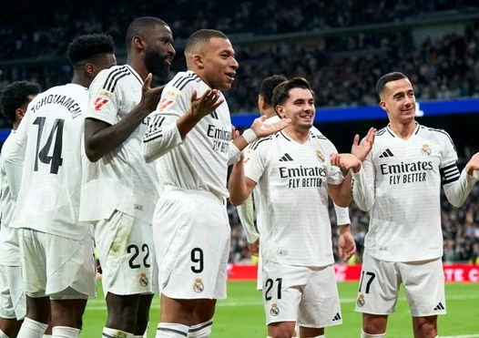 Kylian Mbappé celebrates after scoring against Sevilla