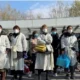 Hospital scene in China with people wearing masks amid Human Metapneumovirus outbreak.