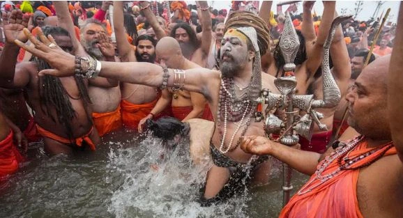 Naga sadhus of Niranjani and Anand Akharas during the first Amrit Snan at Maha Kumbh 2025