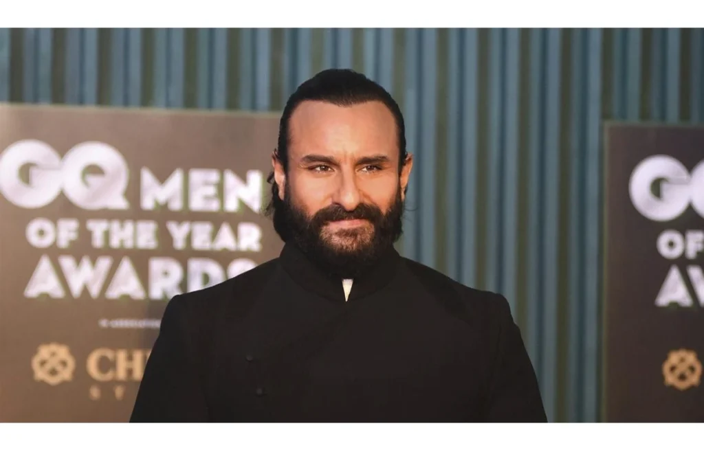 Detained individual linked to the stabbing of Bollywood actor Saif Ali Khan being escorted by police.