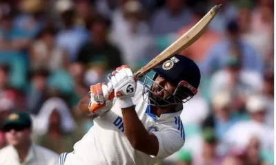 Rishabh Pant celebrates his half-century against Australia during the fifth test in Sydney.