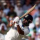 Rishabh Pant celebrates his half-century against Australia during the fifth test in Sydney.