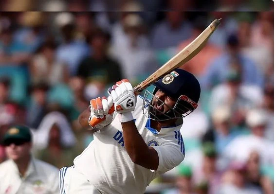 Rishabh Pant celebrates his half-century against Australia during the fifth test in Sydney.