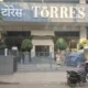 Investors gather outside Torres Jewellery store in Mumbai demanding their money back after being scammed in a Ponzi scheme.