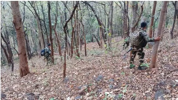 Security forces during a nighttime operation in Chhattisgarh's forest area