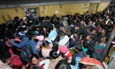 Delhi Railway Station stampede aftermath with overcrowded platforms