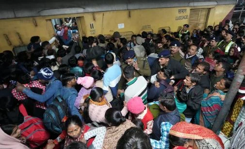 Delhi Railway Station stampede aftermath with overcrowded platforms