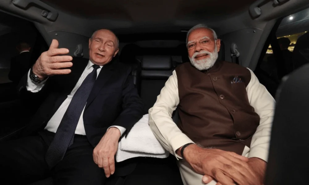 Vladimir Putin rides in Indian PM Narendra Modi's car on India visit